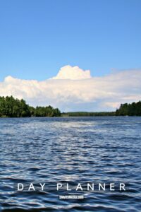 book cover with lake and trees